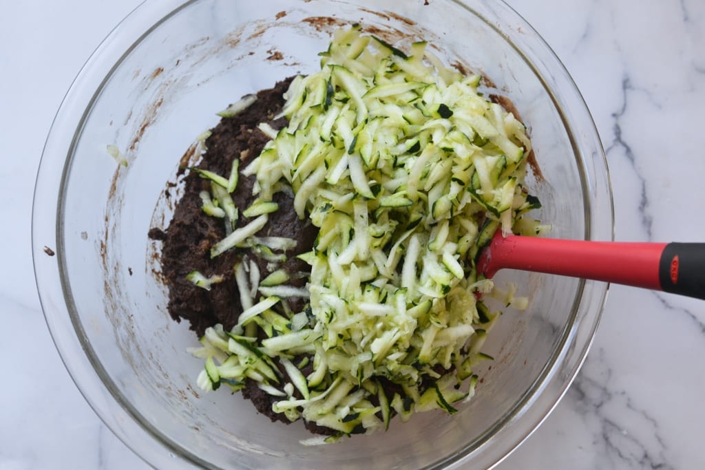 how to make Chocolate Zucchini Muffins- add zucchini
