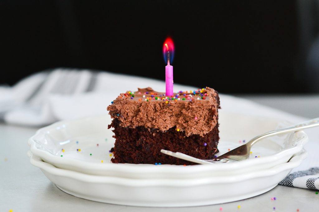 Gluten Free Wacky Cake with a birthday candle