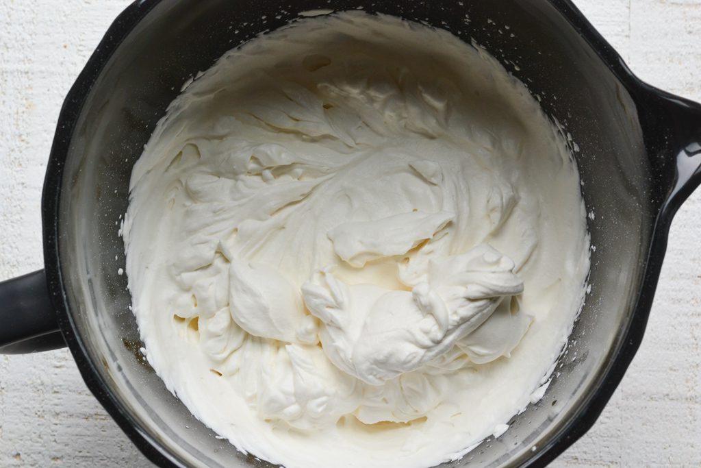 whipping the cream in a stand mixer