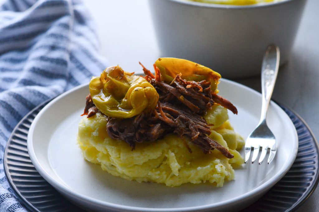 Cheddar Mashed Potatoes topped with Mississippi pot roast